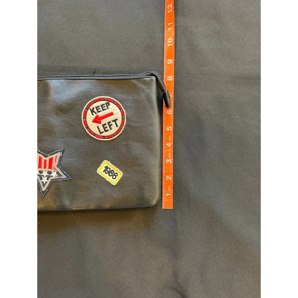 Black Faux Leather Patch Clutch Bag with Tassel Zipper Pull and Interior Pockets